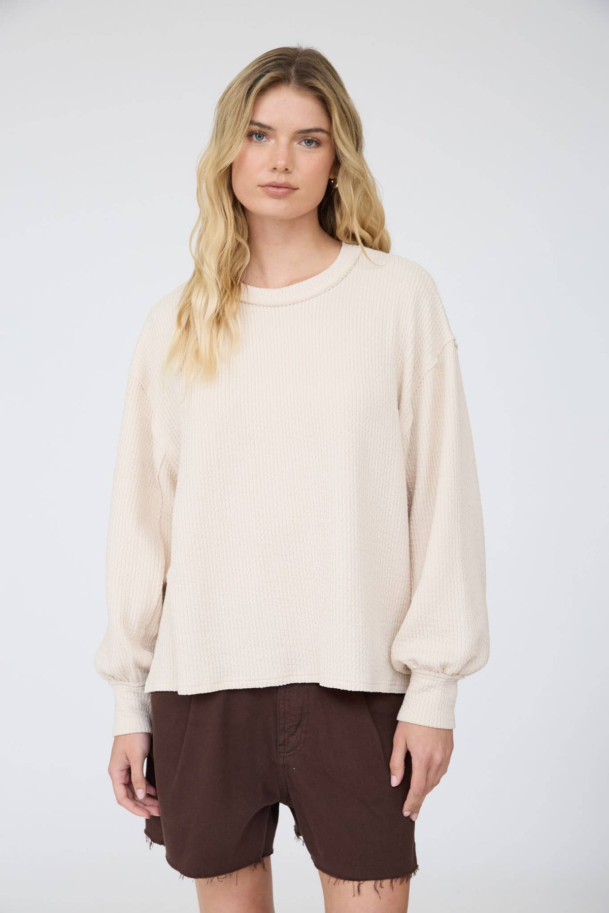Blu Pepper Textured Exposed Seam Long Extended Sleeve Knit Top - Natural front view