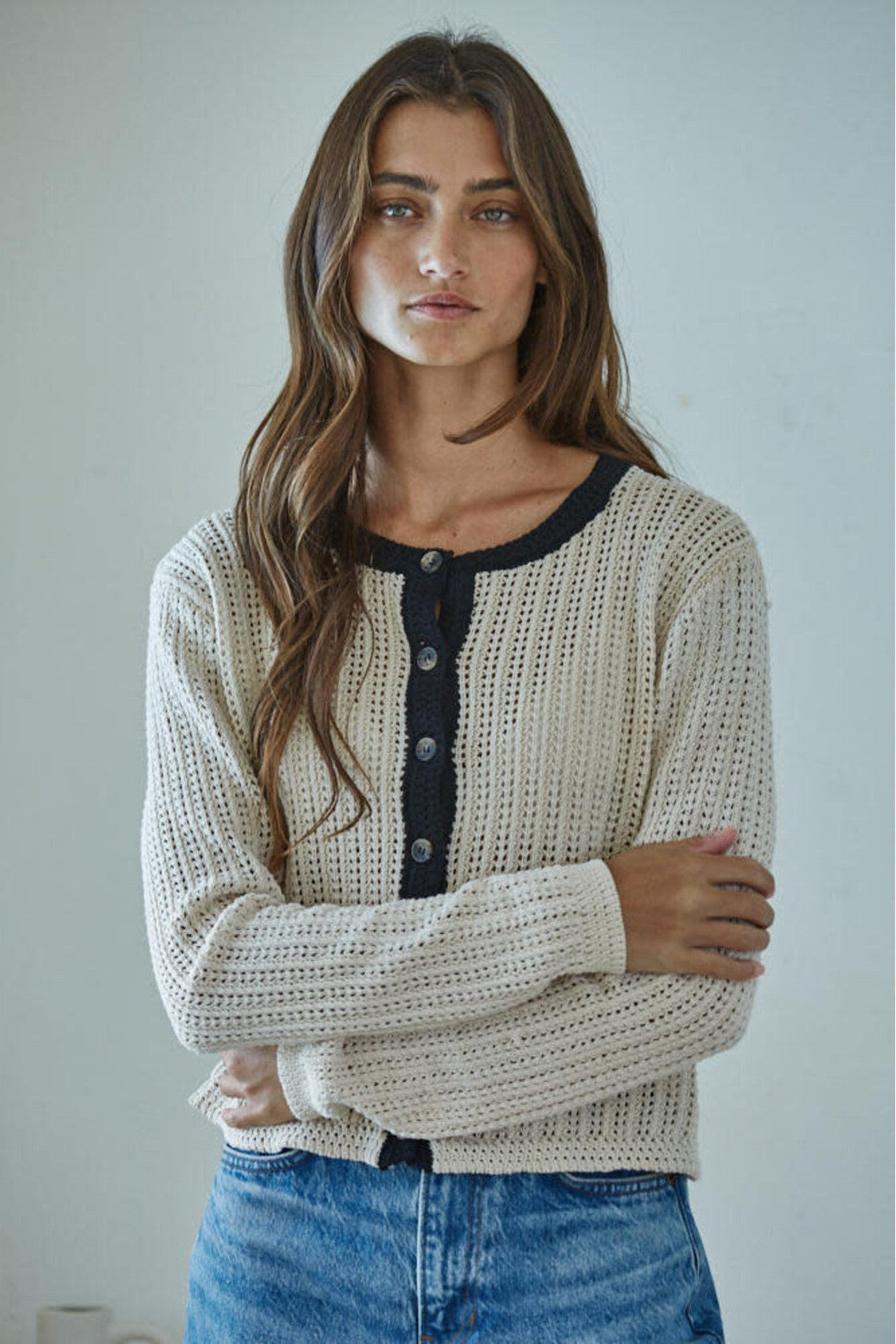 Front view of the By Together Huron Cardigan Top in Natural with black trim