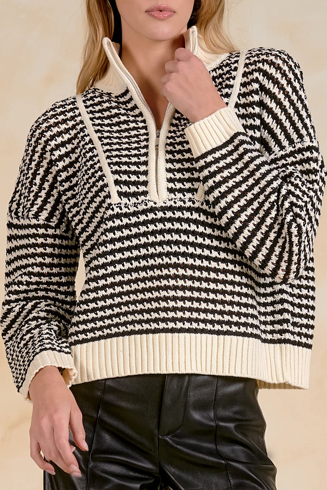 Back view of the Elan 1/4 Zip Open Knit Sweater in Black on model