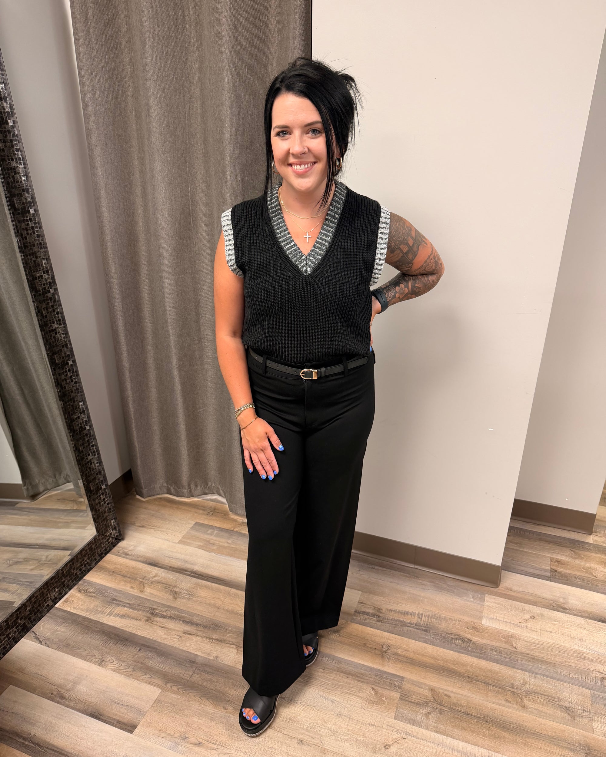 Front view of the Elan Slate Deep V Sweater Vest in Black