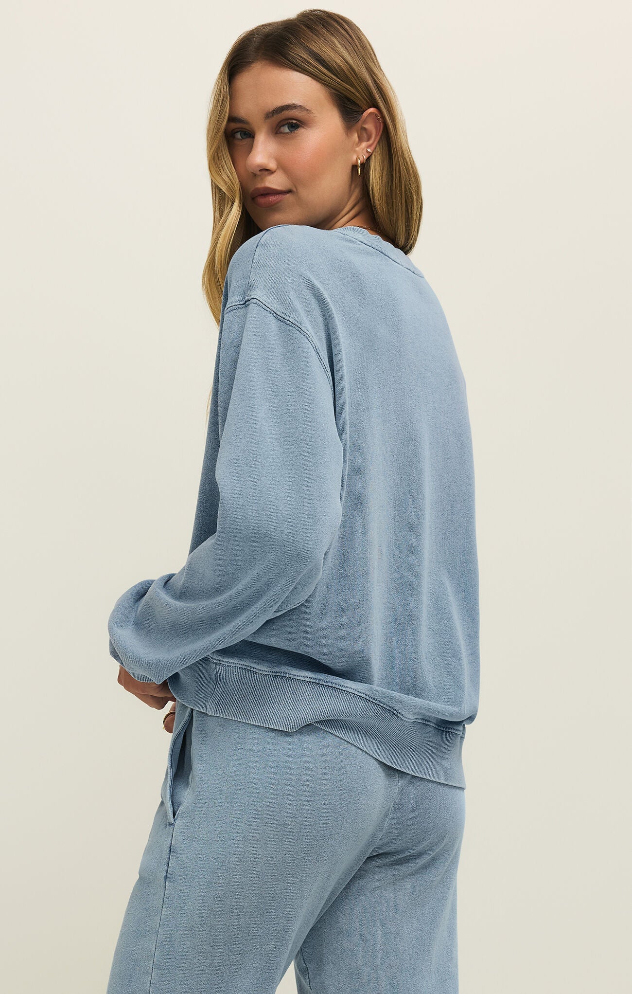 Z Supply Boyfriend Denim Sweatshirt in Ocean Air Indigo, back view