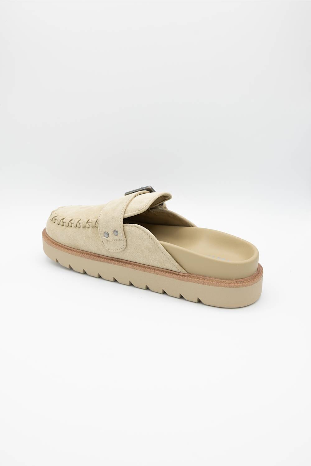 Close-up of the braided upper and buckle detail on the MIA Zaina Lug Clog