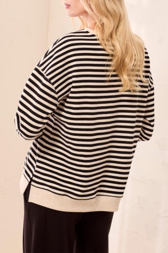 Side view of the Tribal Crew Neck Top W/Combo in Black