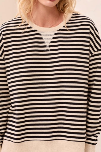 Close-up of the contrast combo detail on the Tribal Crew Neck Top